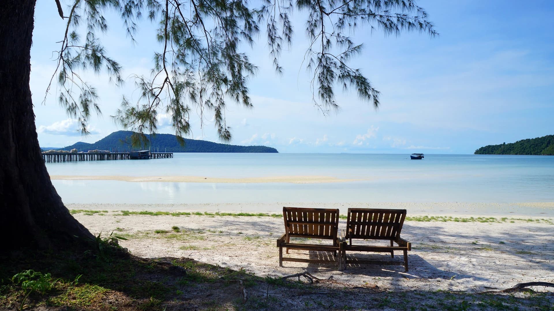 Wooden pier and calm turquoise water at Koh Rong Sanloem, Cambodia