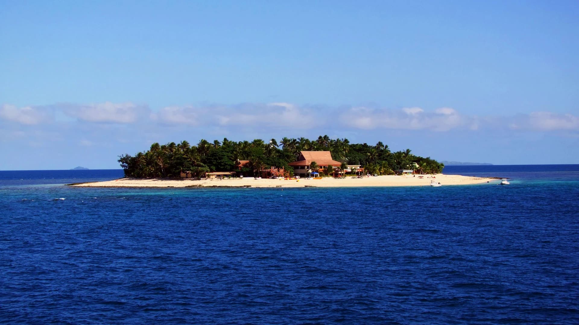 A small palm-covered island in the Mamanuca Islands, Fiji