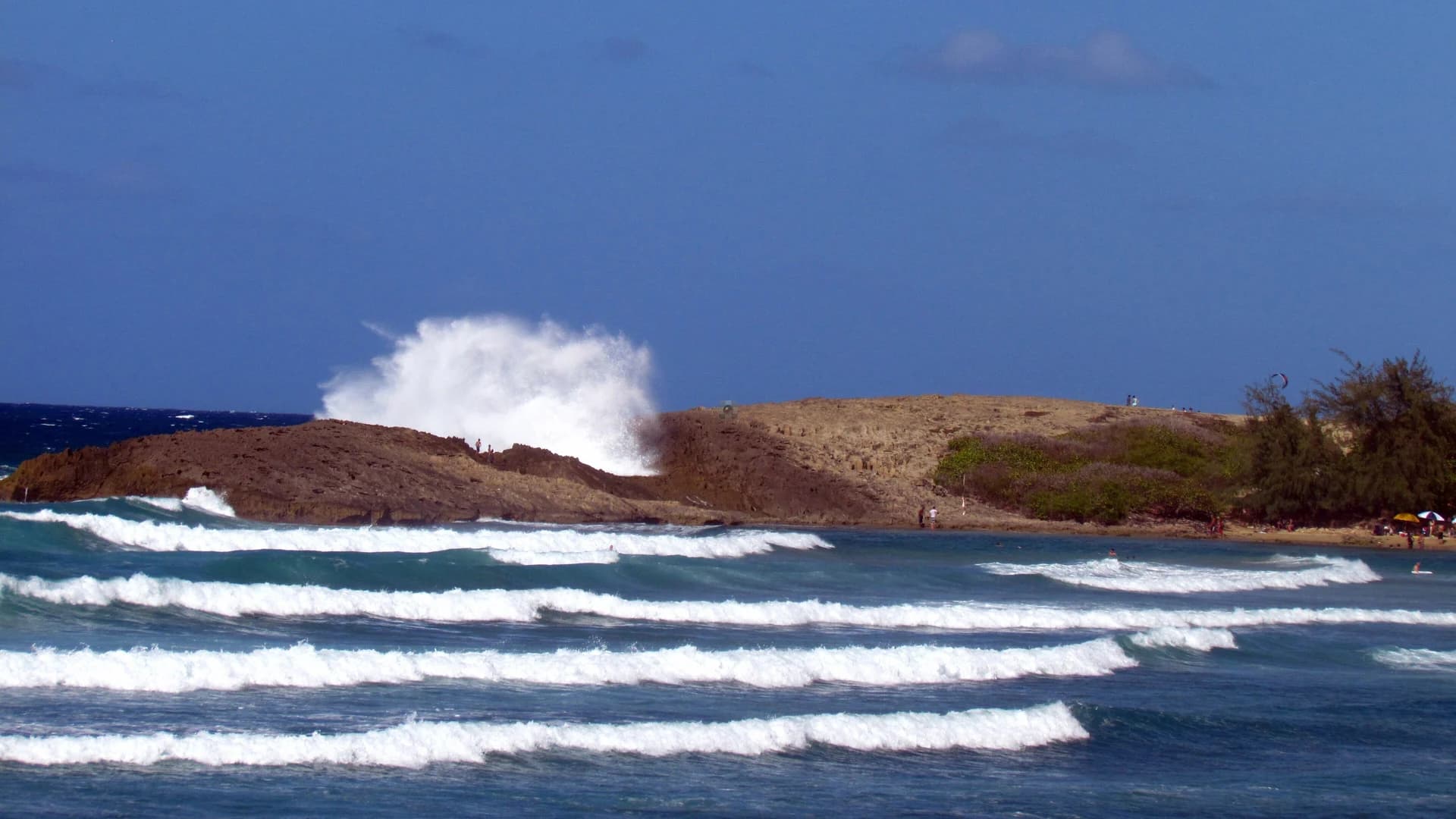 A large wave breaking on the rocky point at Playa de Isabela, Puerto Rico