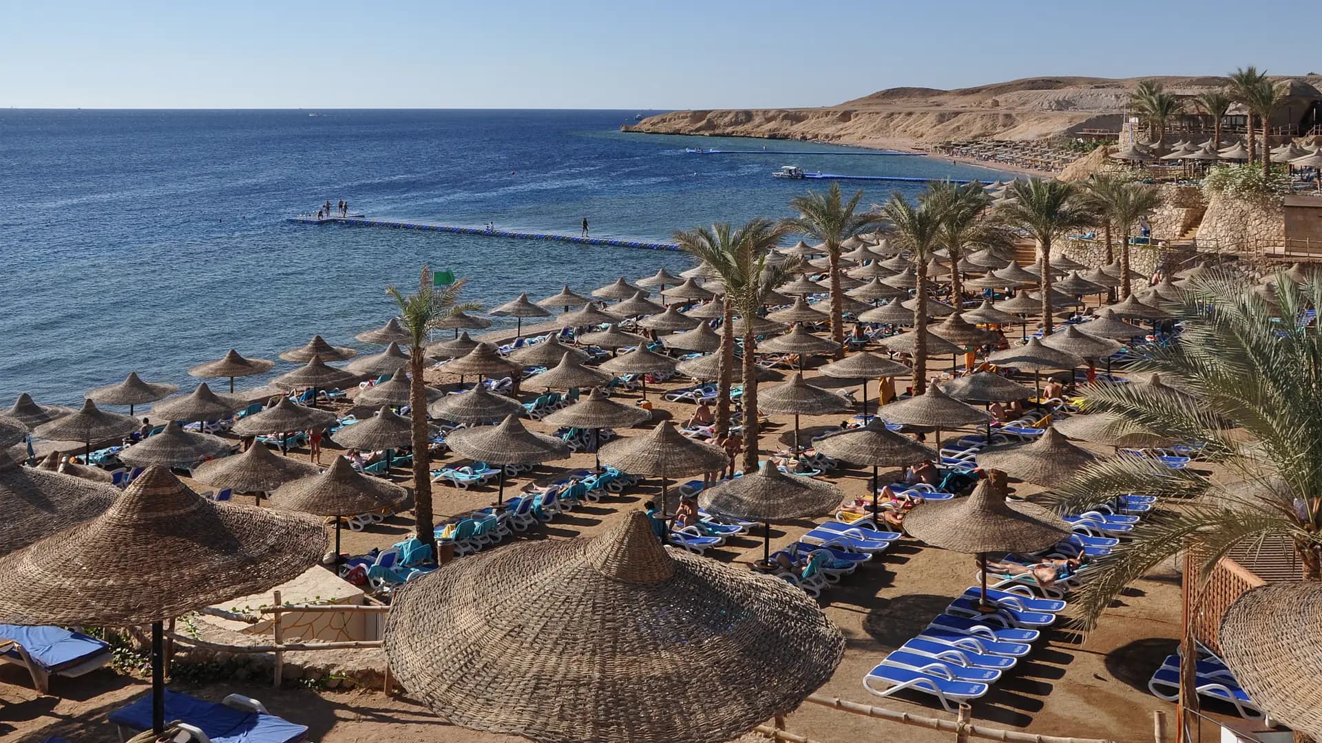 Parasols and loungers on a Red Sea beach at Sharm El Sheikh, Egypt