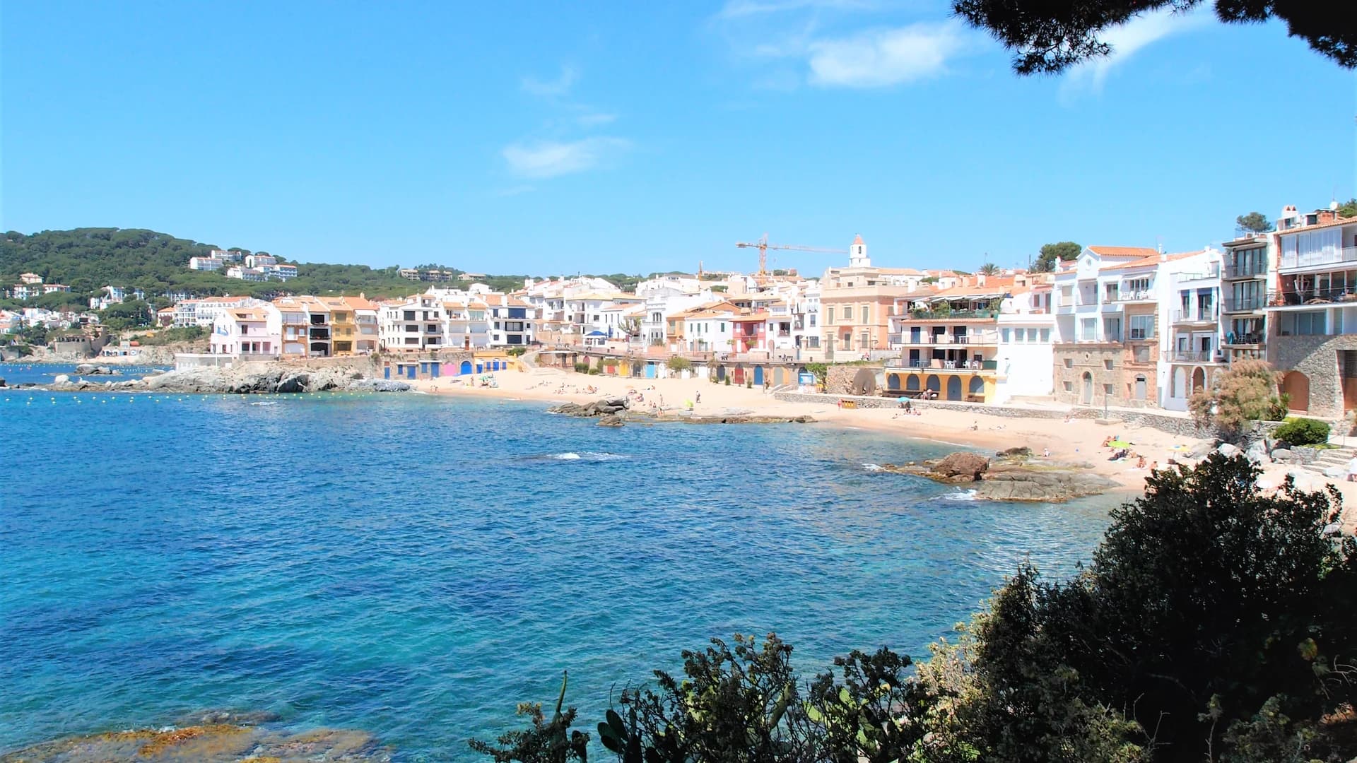 Calella de Palafrugell's beach and whitewashed houses on the Costa Brava, Spain