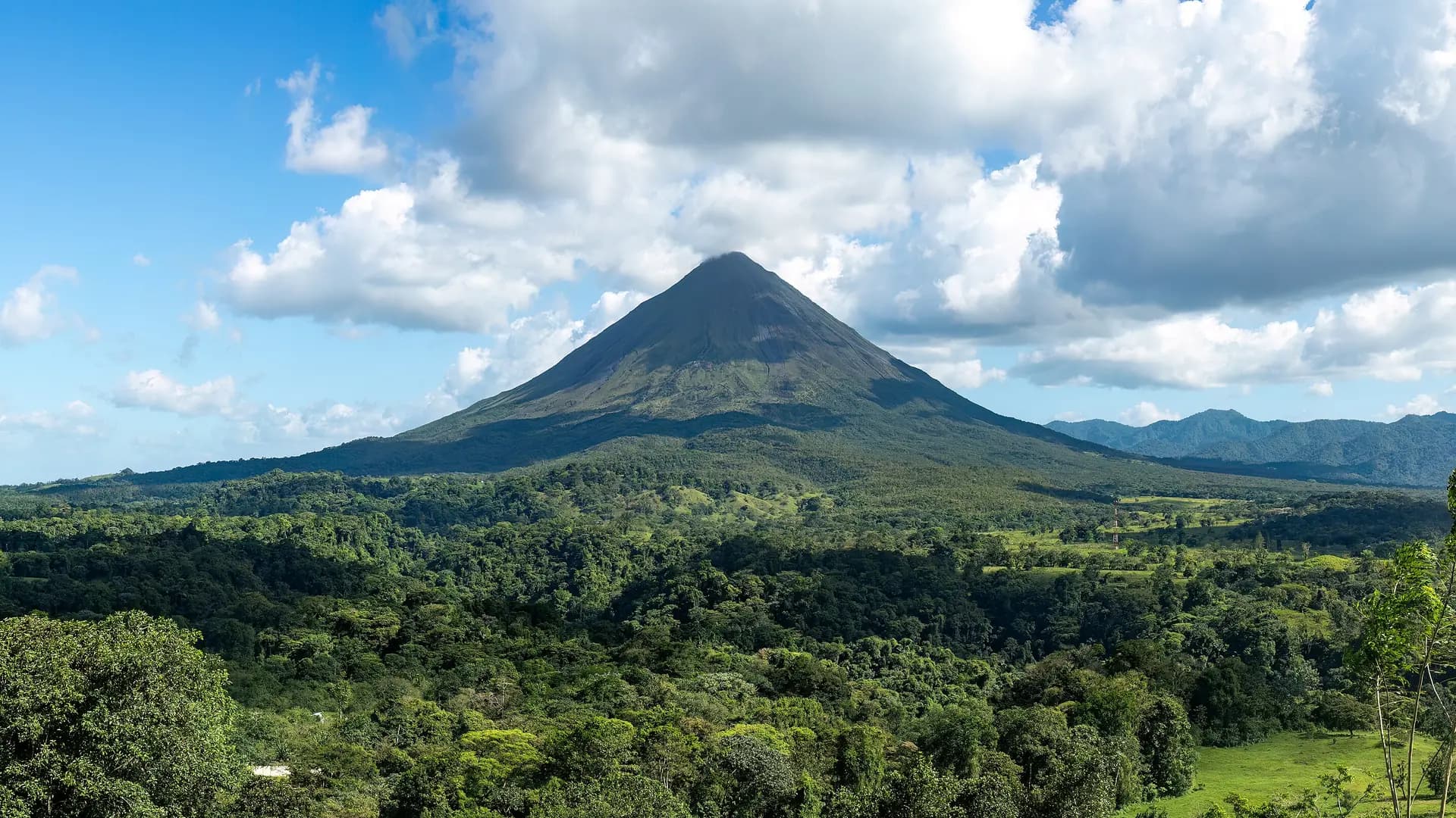 Arenal Volcano rising above the rainforest, Costa Rica