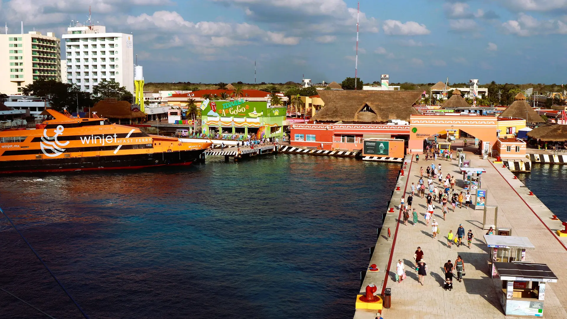 Tour boats and the cruise pier on the waterfront at San Miguel de Cozumel, Mexico