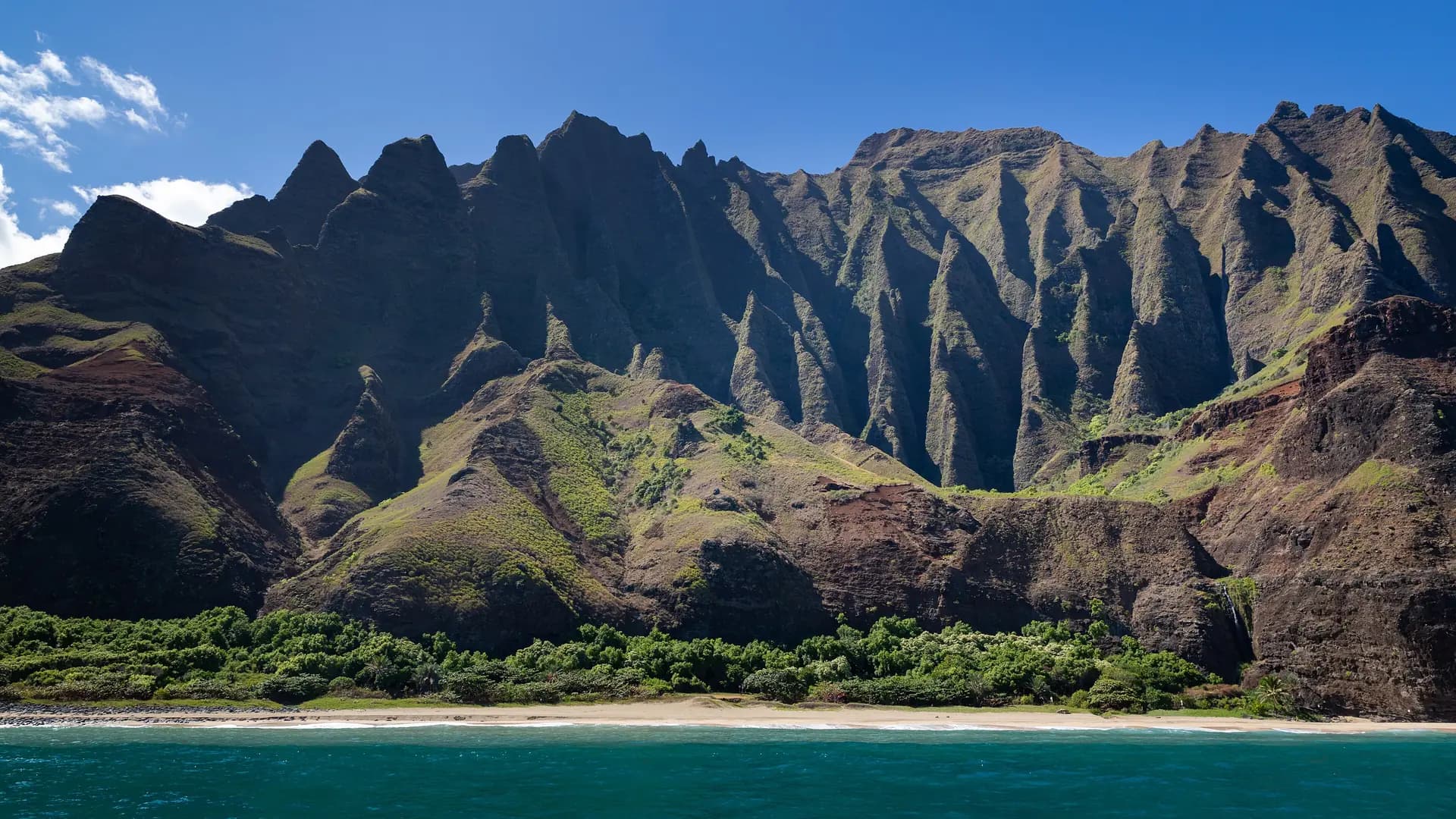 Na Pali Coast cliffs rising above the ocean, Kauai, Hawaii
