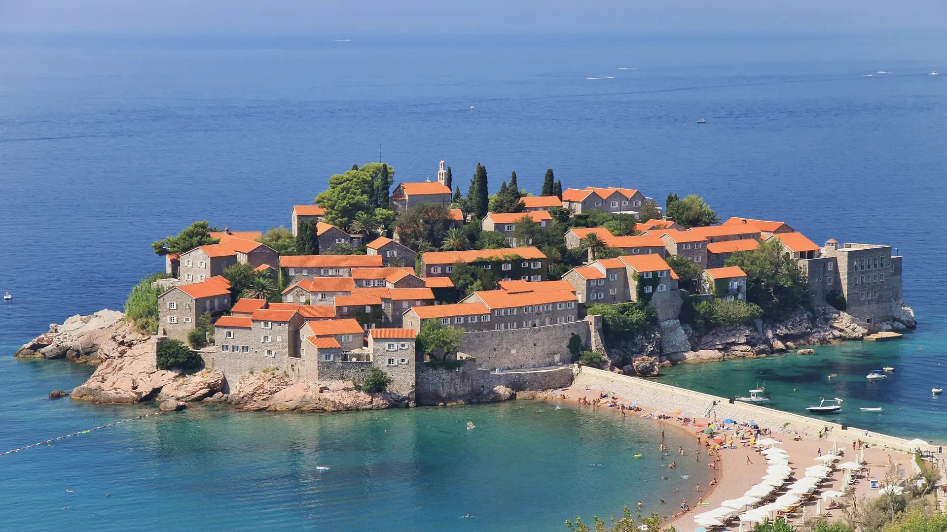 The historic island village of Sveti Stefan, Montenegro, connected to the mainland by a narrow causeway