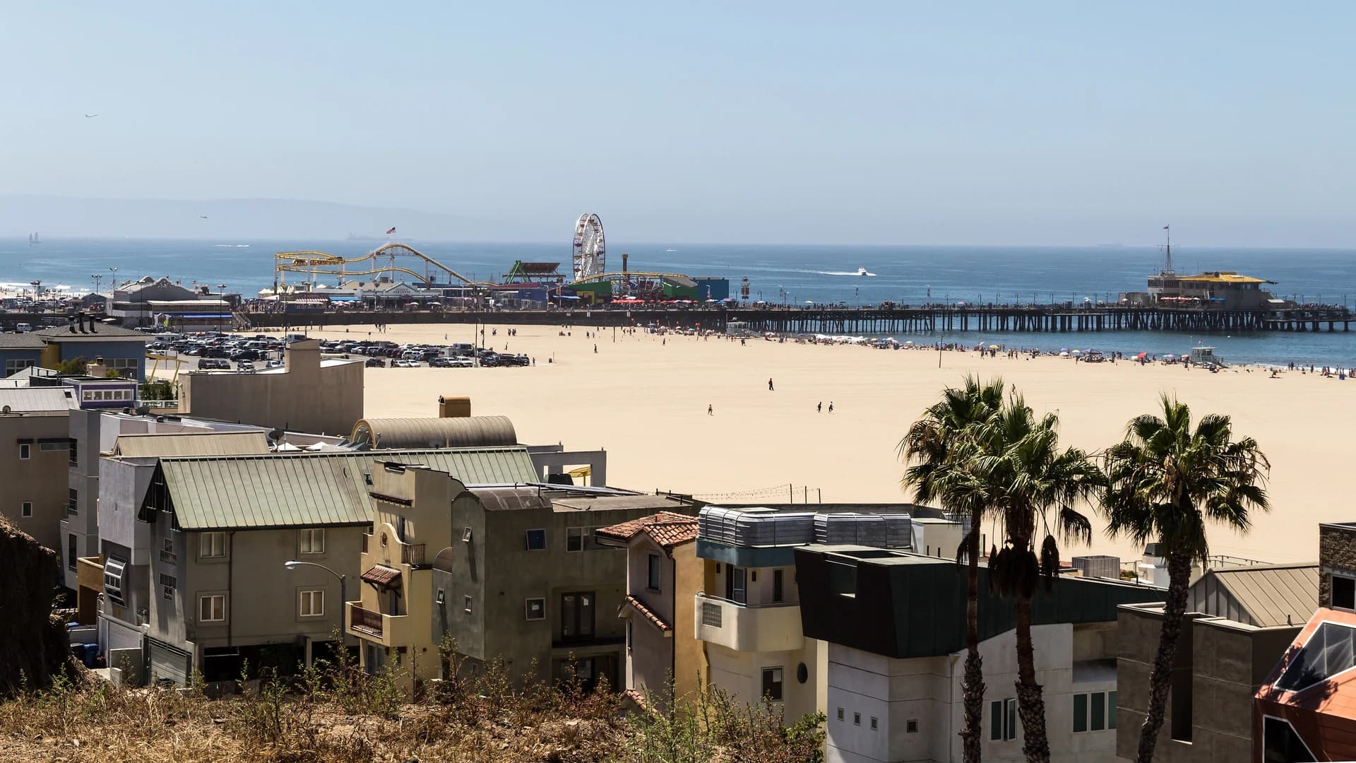 Santa Monica Beach and pier with the Ferris wheel, seen from the Palisades bluff, California