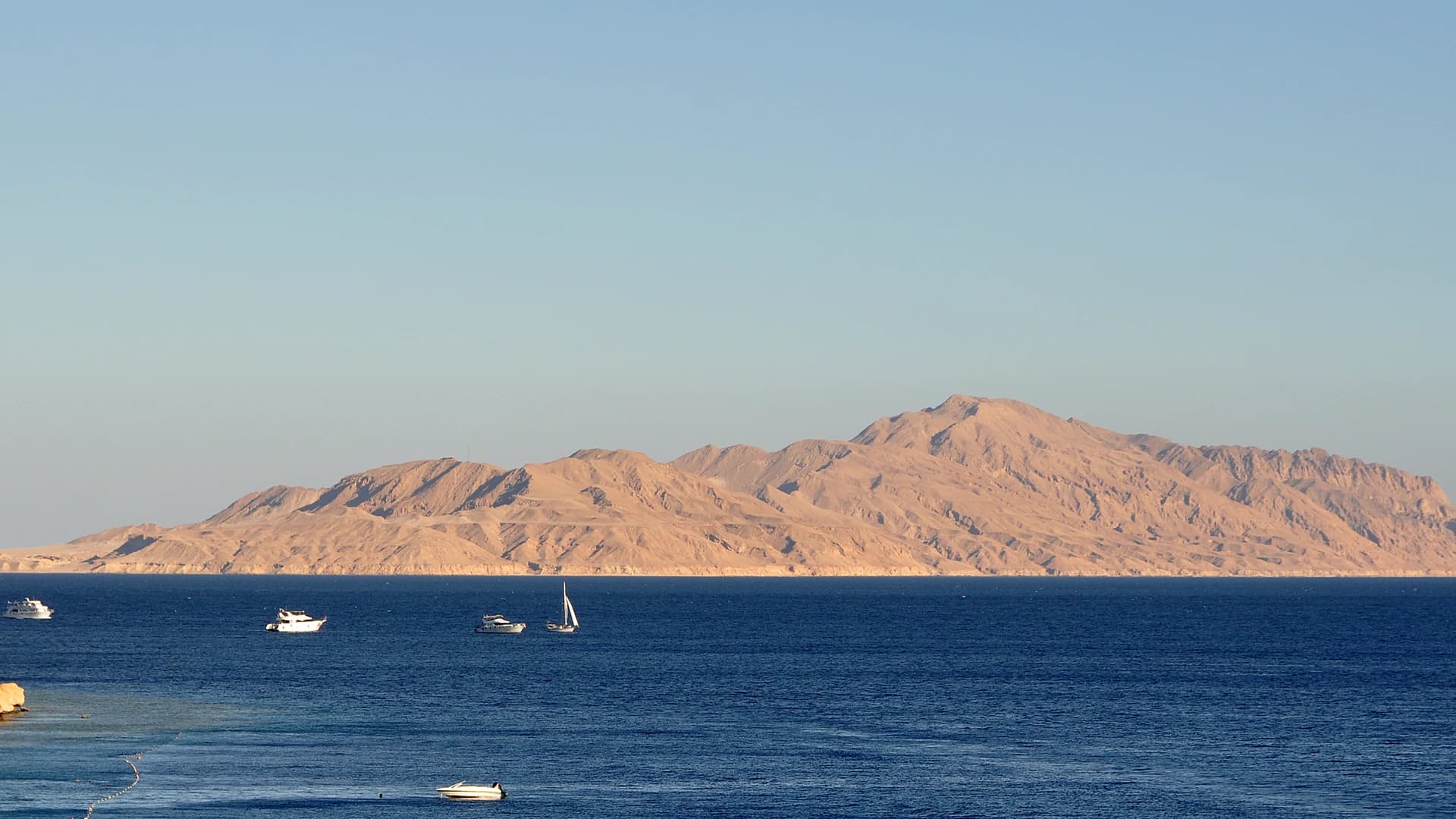 Tiran Island seen across the Red Sea from the Sinai coast at Sharm El Sheikh, Egypt