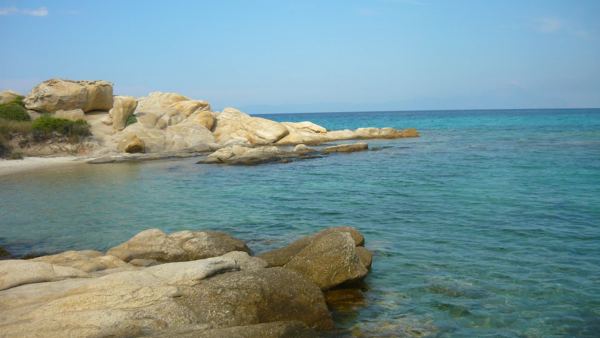 Karidi Beach, turquoise water and granite rocks near Vourvourou, Sithonia, Greece