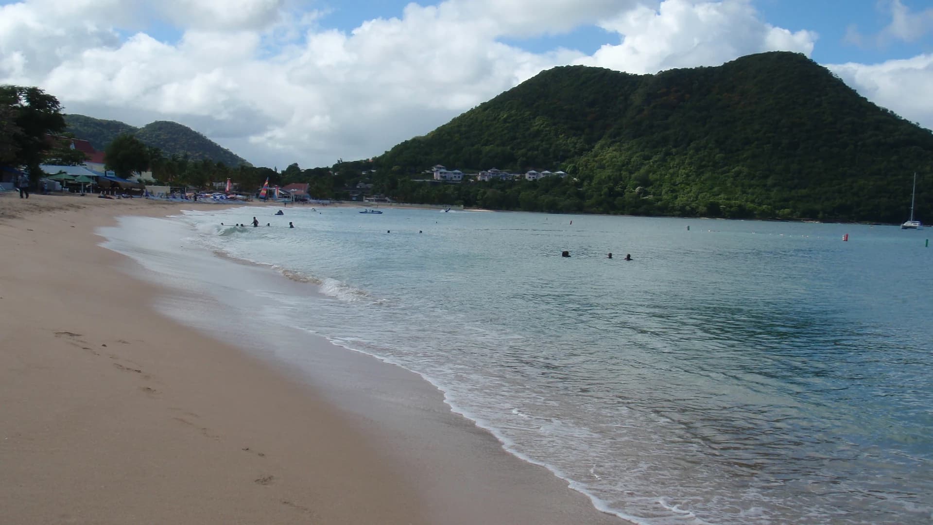 Reduit Beach, Rodney Bay, St Lucia – calm turquoise water and forested hills