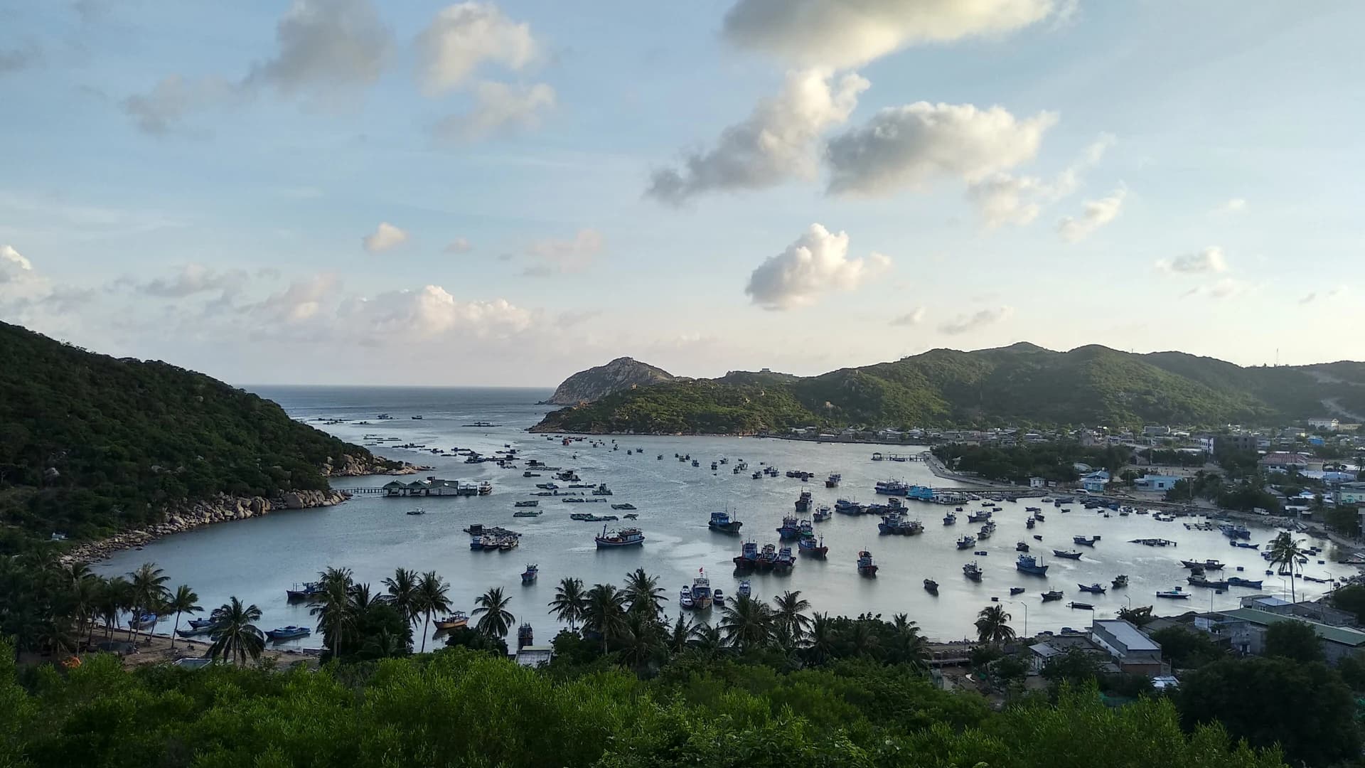 Fishing boats in the calm waters of Vinh Hy Bay, Ninh Thuan, Vietnam